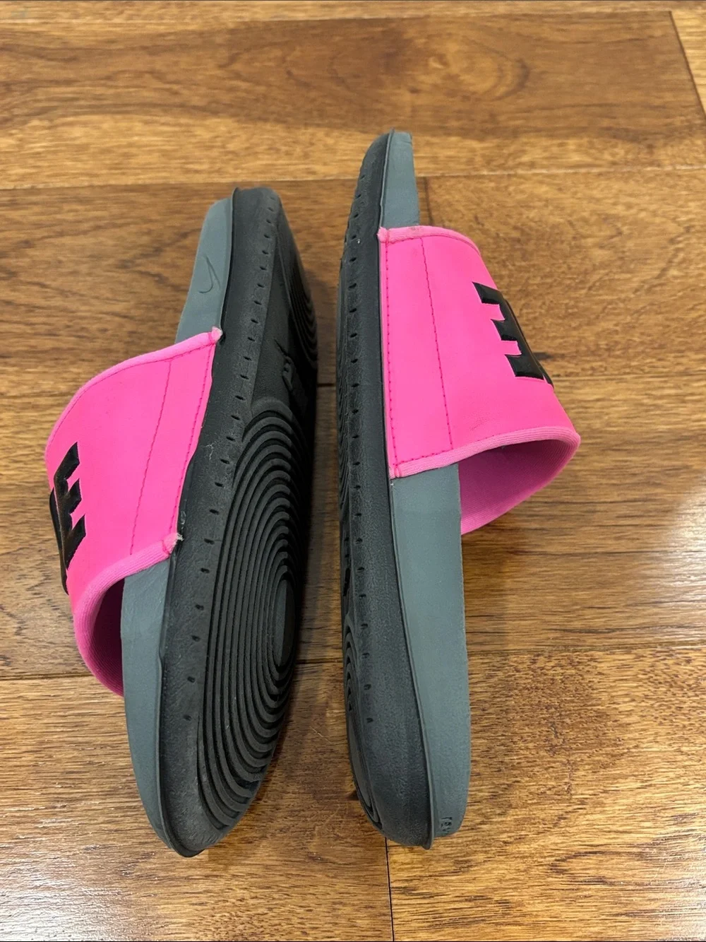 Nike Women’s Pink and Gray Slide Sandals with Bold Logo
